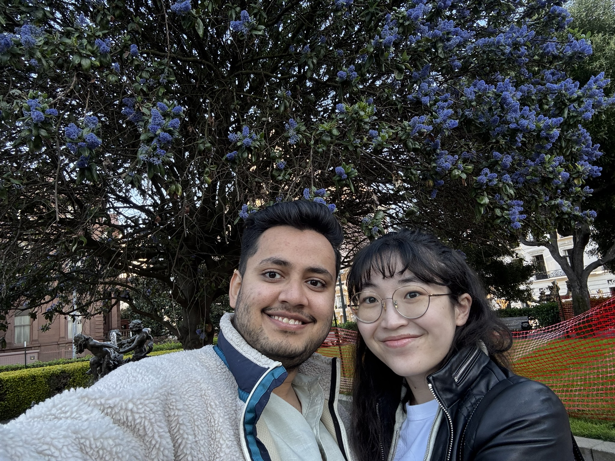 Bettina and Ajay among the blossoms at Huntington Park in San Francisco